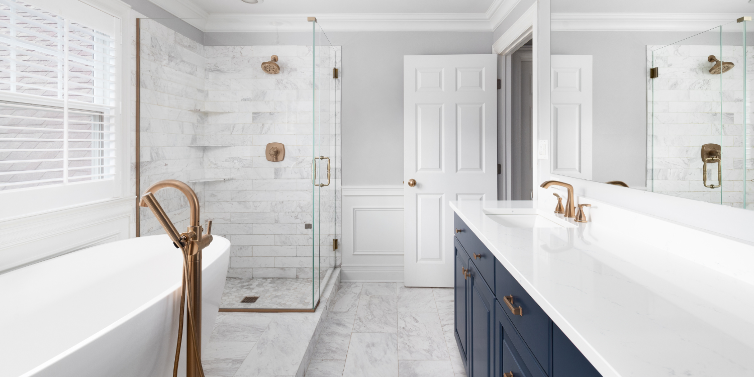 Modern Luxury White Bathroom With Navy Vanity - What Are the Essential Steps for Planning a Luxury Home Renovation?